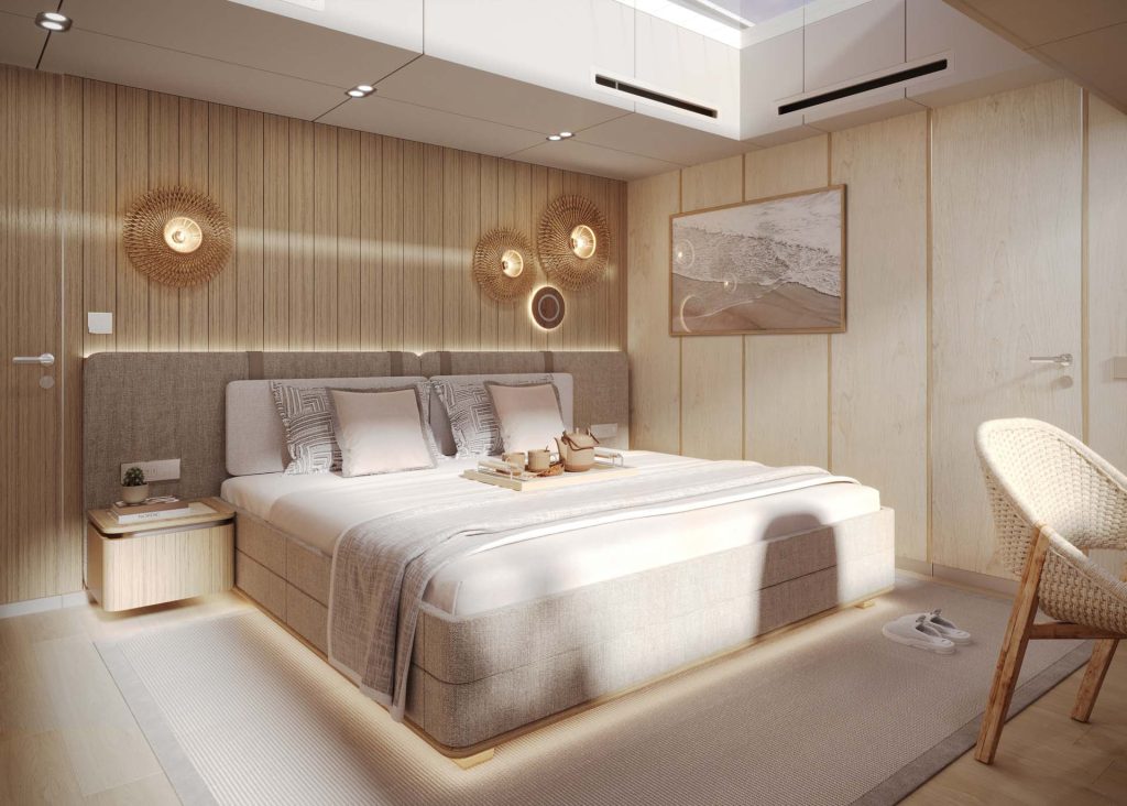 Luksusowe wnętrze sypialni na jachcie Sunreef Yachts, z wygodnym łóżkiem podwójnym z dekoracyjnymi poduszkami, drewnianymi ścianami i eleganckim oświetleniem. Koszykowe krzesło i spokojny obraz na ścianie dopełniają atmosferę spokoju.